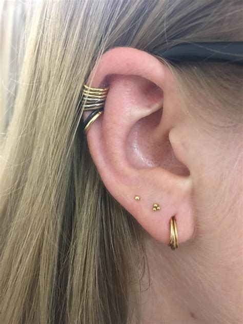 coin slot ear piercing